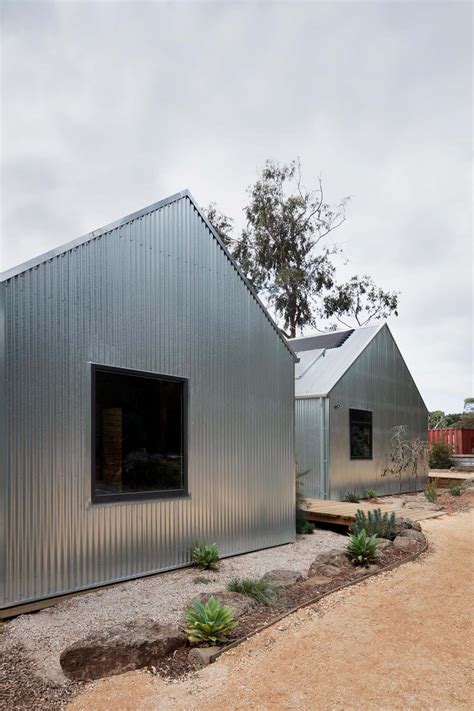 house covered with corrugated metal|homes with metal siding photos.